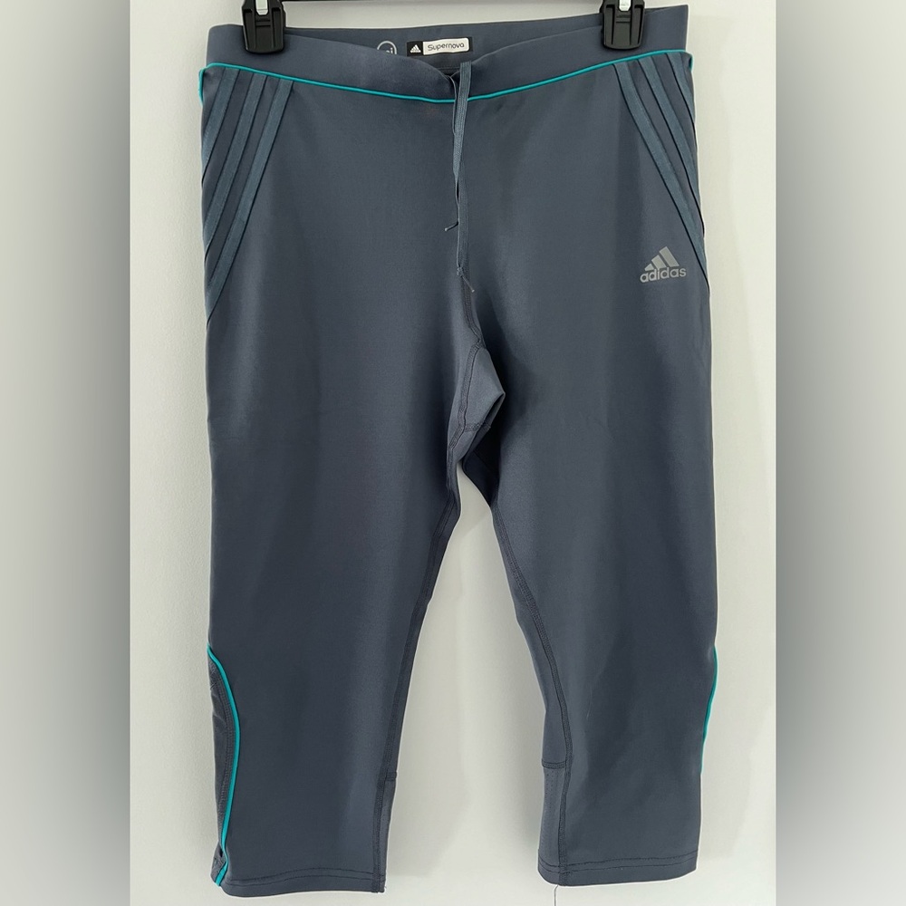 Adidas Supernova climate 3/4 pants Dark Green with blue lines details